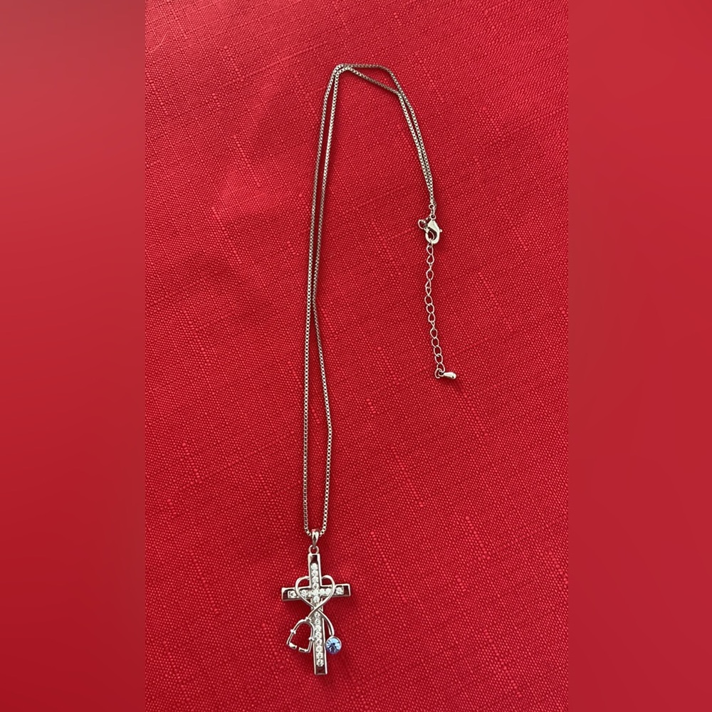 Women’s Studded Cross with Stethoscope.